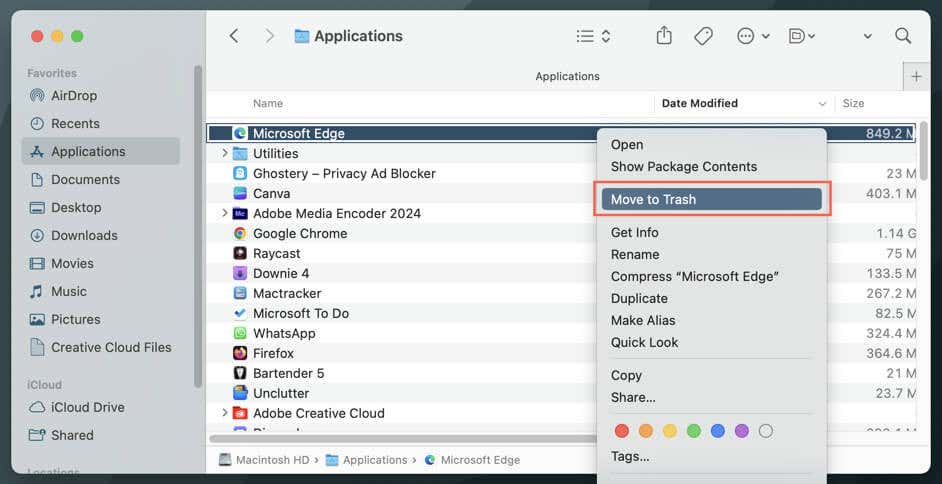 تم تمييز خيار القائمة السياقية "نقل إلى سلة المهملات" لبرنامج Microsoft Edge في Finder.